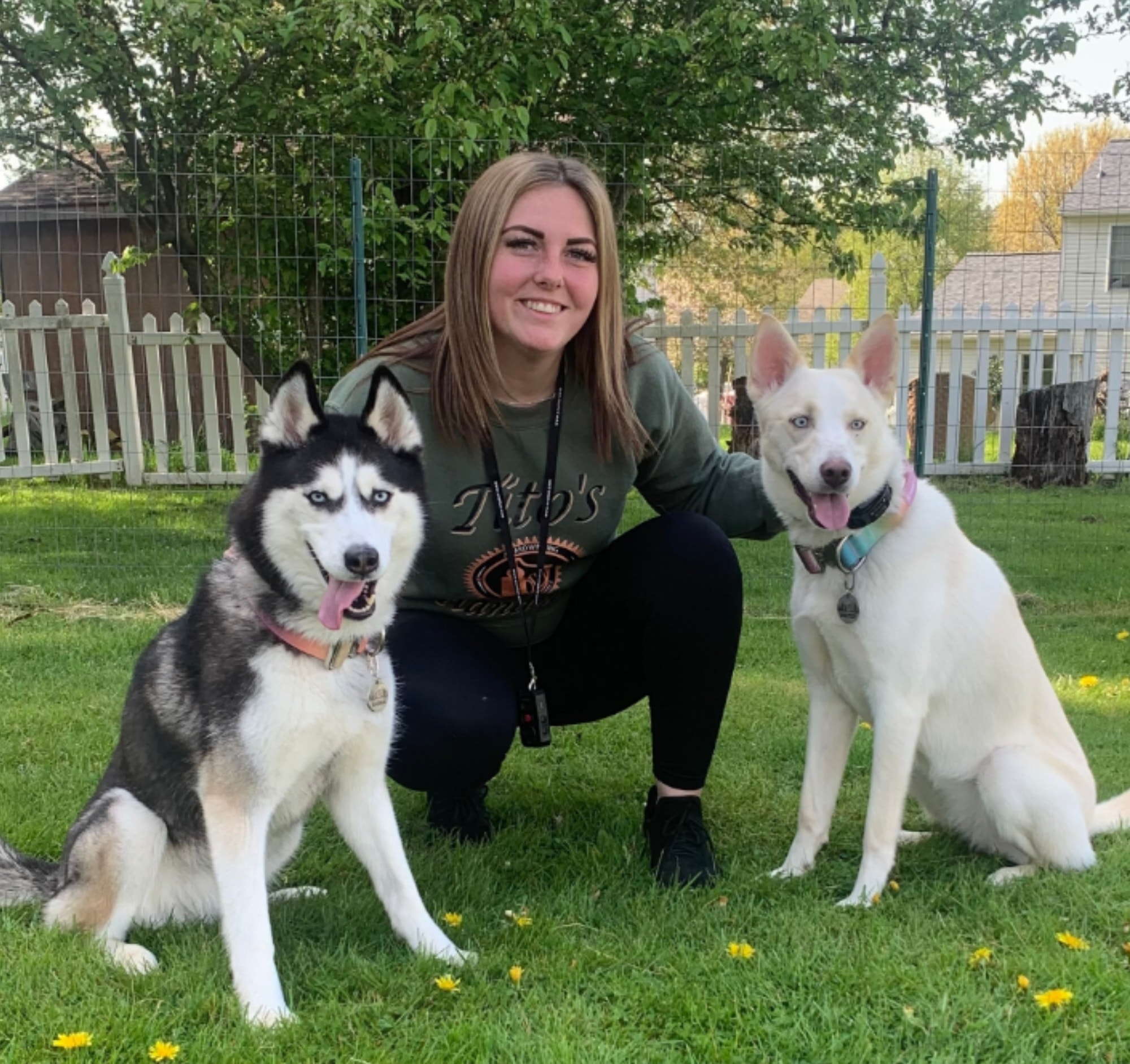 Katie training a dog outdoors